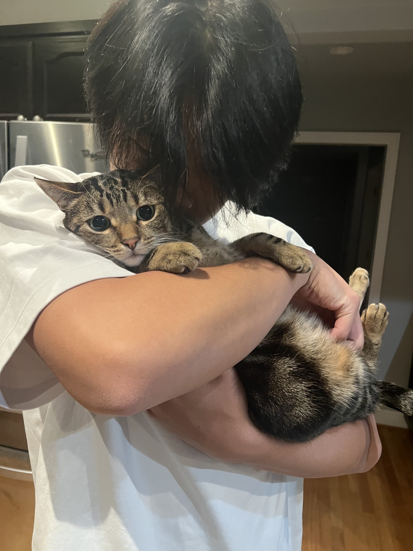 Growing up, still holding her close