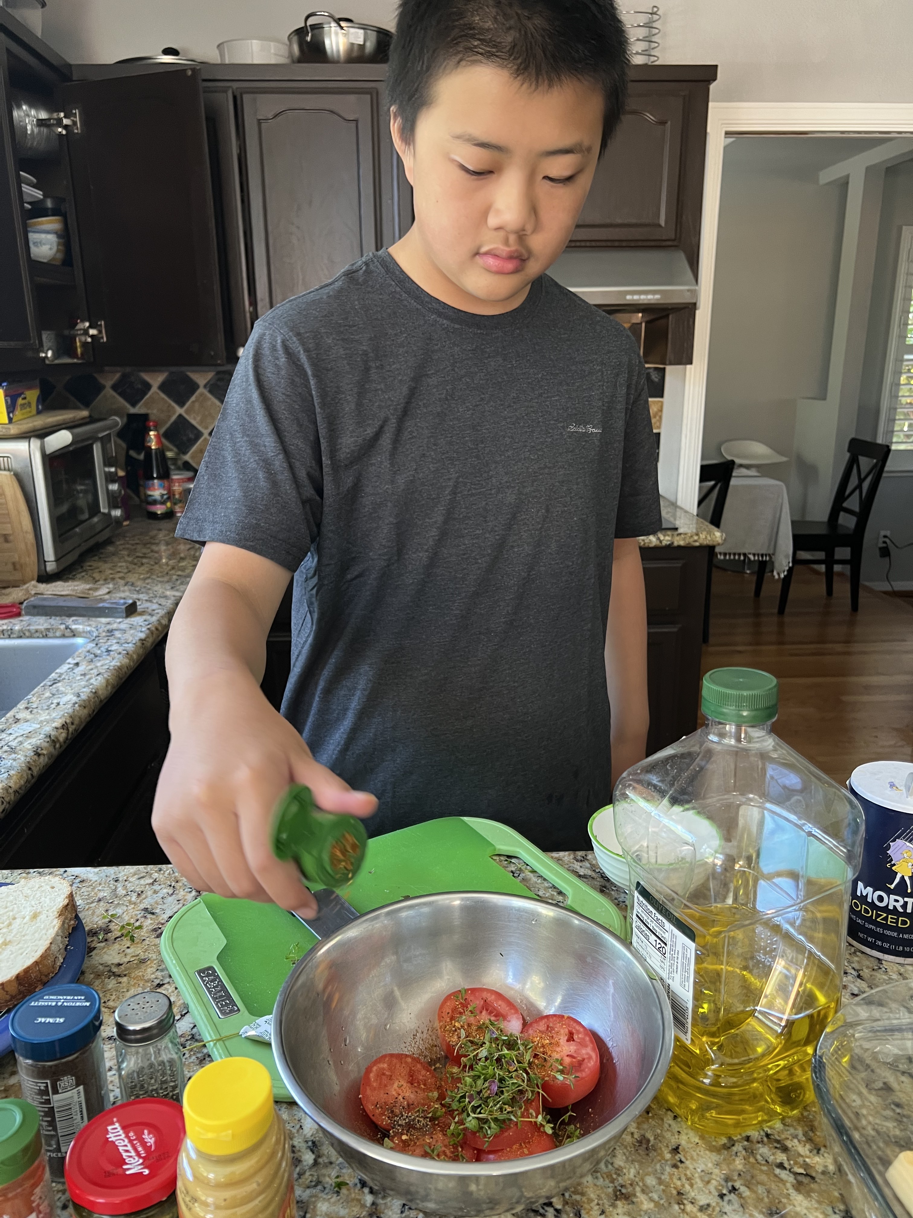 Seasoning the tomatoes