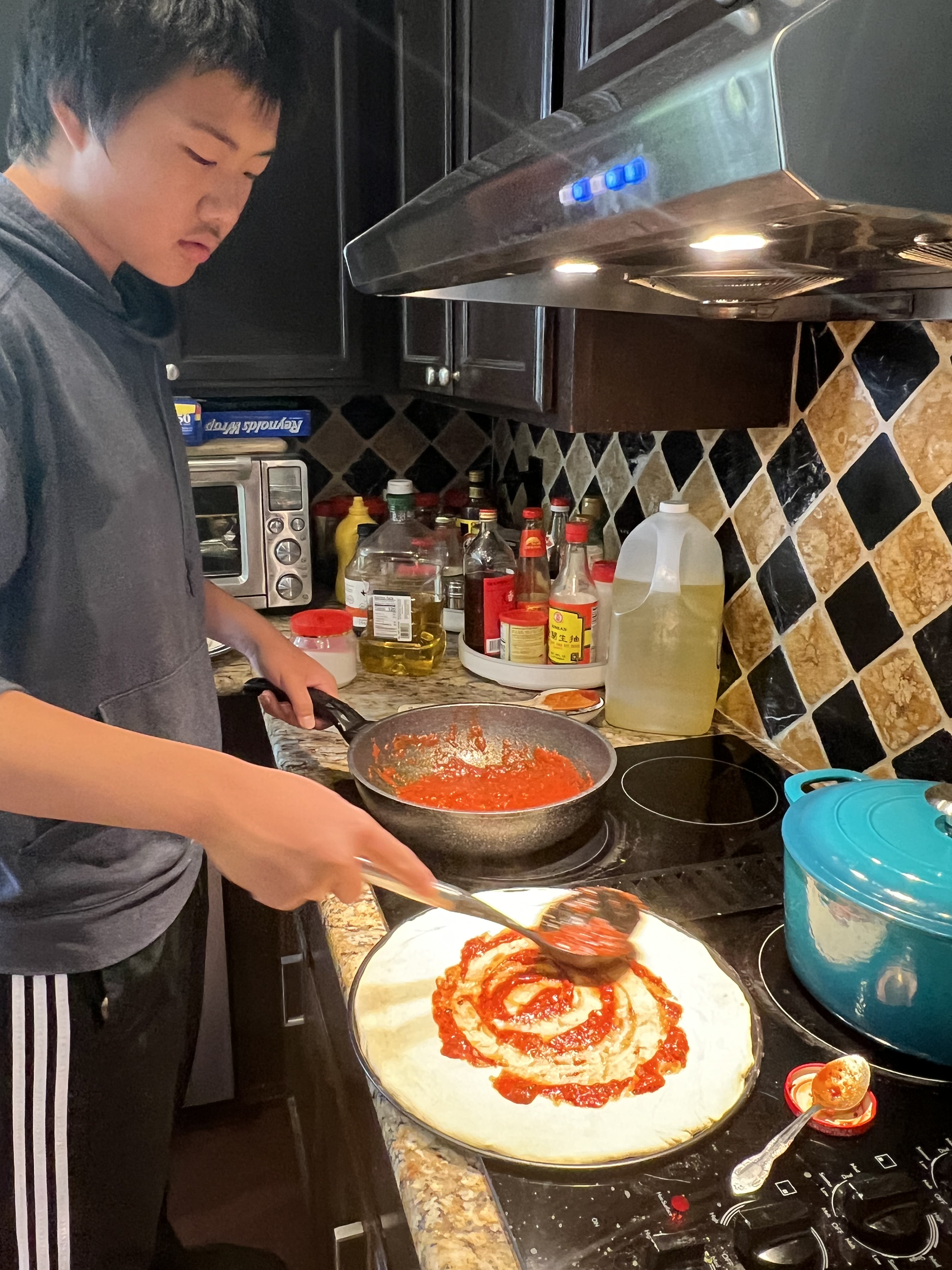 Spreading the sauce